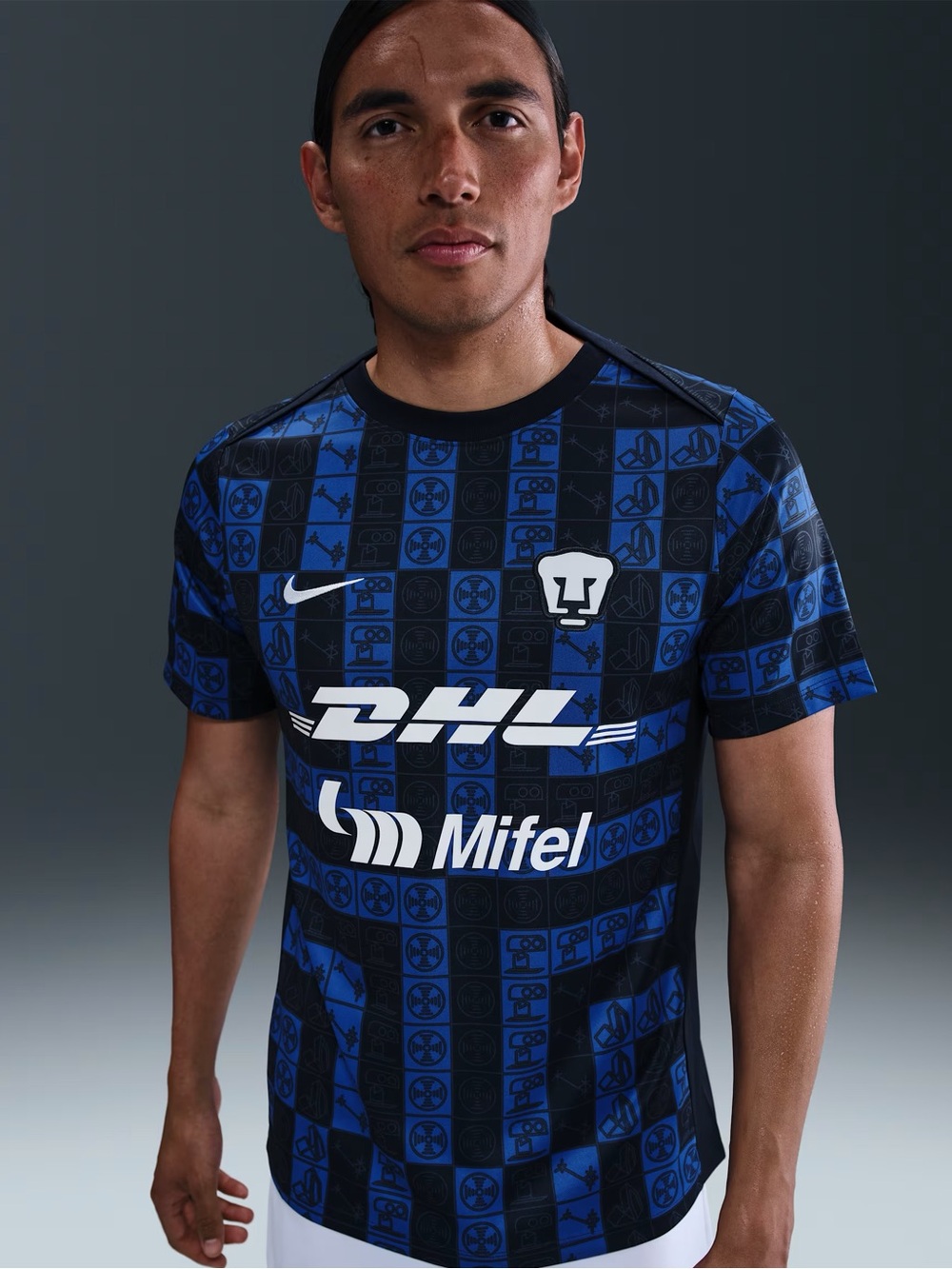 Nike Pumas UNAM Academy Pro pre-match jersey in navy blue and black